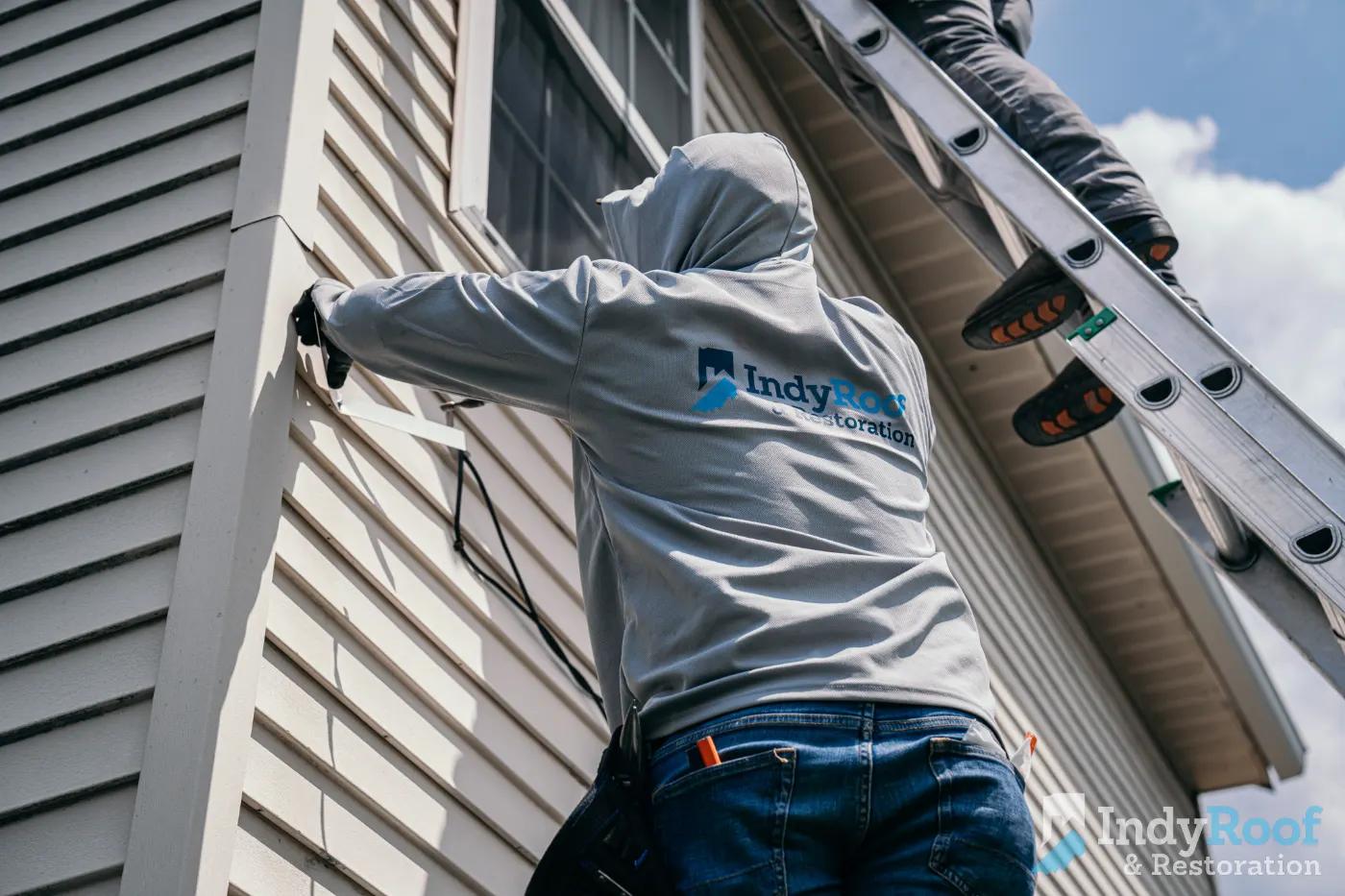Siding installation documented in Crooked Creek